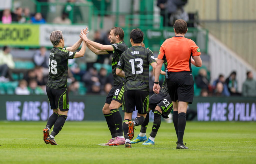 Celtic Celebrate as Referee David Dickinson Looks on